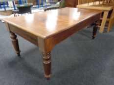 A Victorian mahogany dining table