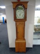A 19th century oak cased longcase clock with painted dial by Bell of Hexham,