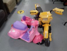 A ride on electric motocross bike with stabilisers together with a ride on scooter with doll