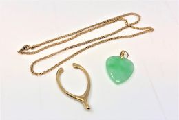 A 9ct gold necklace, 2.1g, together with 9ct gold wishbone pendant 3.1g and heart shaped pendant.