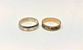 A 9ct gold textured band ring, 1.8g, together with a silver band ring.