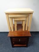 A nest of three pine tables together with a contemporary lamp table fitted a drawer