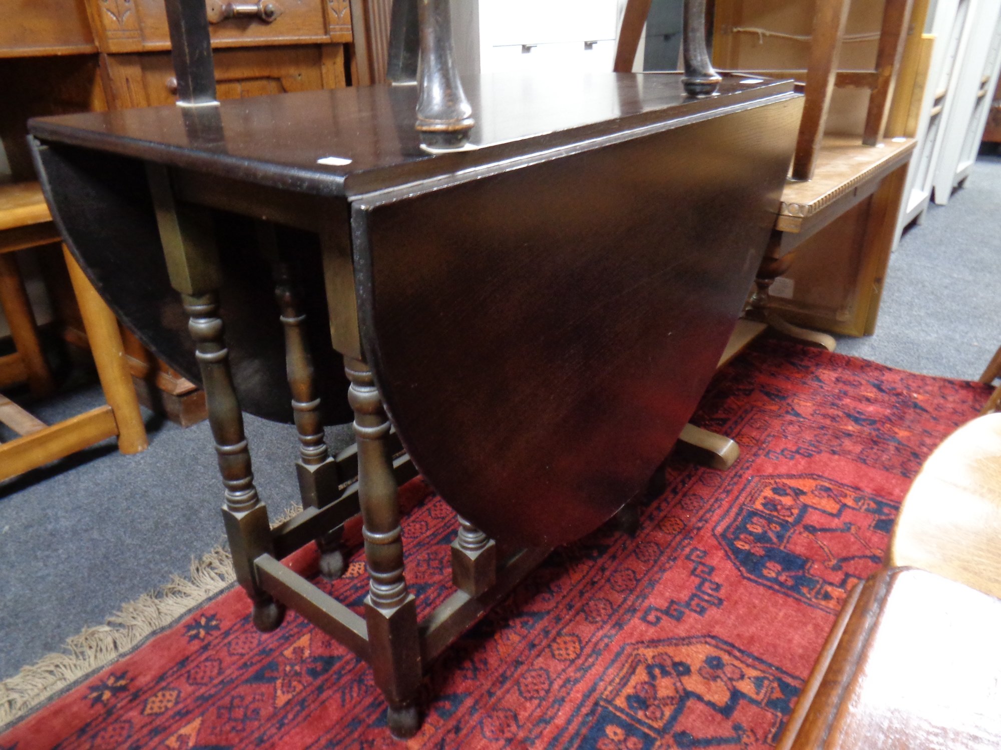 An oak gateleg table