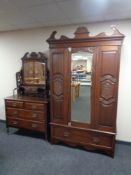 A 19th century mahogany mirror door wardrobe and a four drawer dressing chest