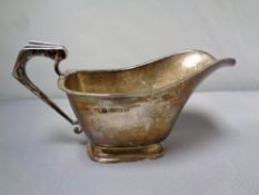 A Birmingham silver cream jug,