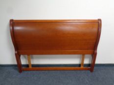 An Olympus Furniture cherry wood 5ft headboard