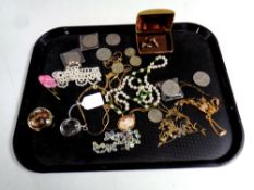 A quantity of costume jewellery, two £2 coins, Crowns etc.