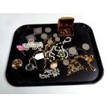 A quantity of costume jewellery, two £2 coins, Crowns etc.