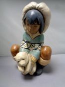 A Lladro figure - Poor Little Bear with Eskimo,