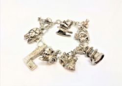 A white metal charm bracelet