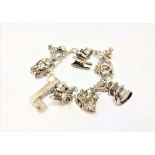 A white metal charm bracelet