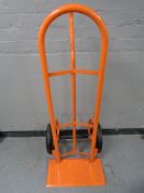 A heavy duty single handled sack barrow with spring axle