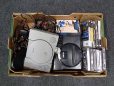 A box containing Sega Megadrive and Sony Play Station console with leads and accessories together