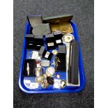 A tray of assorted costume jewellery, pewter pill box, dress rings, cuff links, commemorative coins,