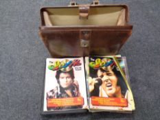 A vintage leather doctor's bag containing 1970s/80s Story of Pop magazines in folders