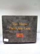 A mid 20th century Boots The Home First Aid case with original contents