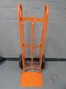 A heavy duty twin handled sack barrow with spring axle (thin tyres)