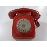 A vintage red telephone