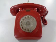 A vintage red telephone