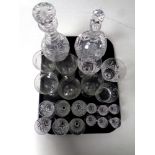 A tray of cut glass lead crystal jug and decanter with stopper,