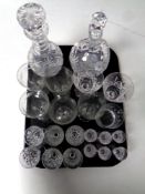 A tray of cut glass lead crystal jug and decanter with stopper,