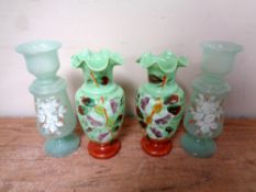 Two pairs of antique green glass hand painted vases