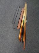 Nine assorted two piece snooker cues,