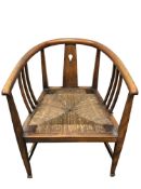 E A Taylor for Wylie & Lochhead, a Glasgow school Arts & Crafts oak armchair,