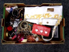 A box containing a large quantity of costume jewellery