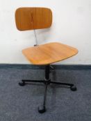 A mid 20th century Jorgen Rasmussen for Rabami Stole Danish teak swivel desk chair