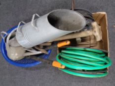 A box and a basket containing hose pipe on reel, extension reel, garden tools,