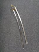 A reproduction cavalry sword with scabbard