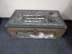 An early 20th century metal bound trunk