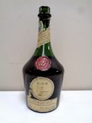 A vintage bottle of DOM Benedictine liqueur,