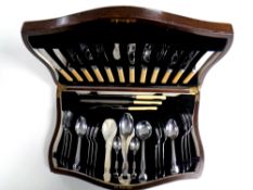 A 20th century oak canteen of chrome and stainless steel plated Utility cutlery