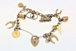 A 9ct gold charm bracelet, 19.g.