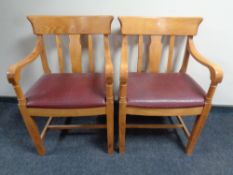 A pair of beechwood armchairs