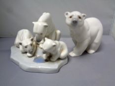 A Lladro figure group - polar bear family at ice hole and a further Lladro figure of a polar bear