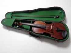 A violin, circa 1900, bearing label Josef Klotz in Mittenwalde anno 1795, in case with bow.