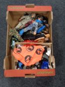 A box containing action man figures,