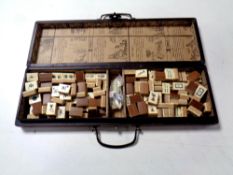 A Mahjong set in a traditional style box
