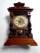 An antique mahogany and pine cased H A C eight day mantel clock with pendulum