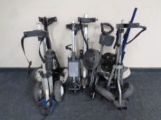 A quantity of folding golf trolleys