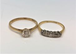 An 18ct gold five stone diamond ring, 2g, together with a 9ct gold paste solitaire ring.