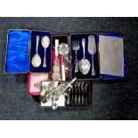 A tray of cased cutlery sets including cake forks, servers,