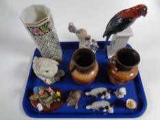 A tray containing assorted ceramics to include Nao figure, pair of pottery vases,