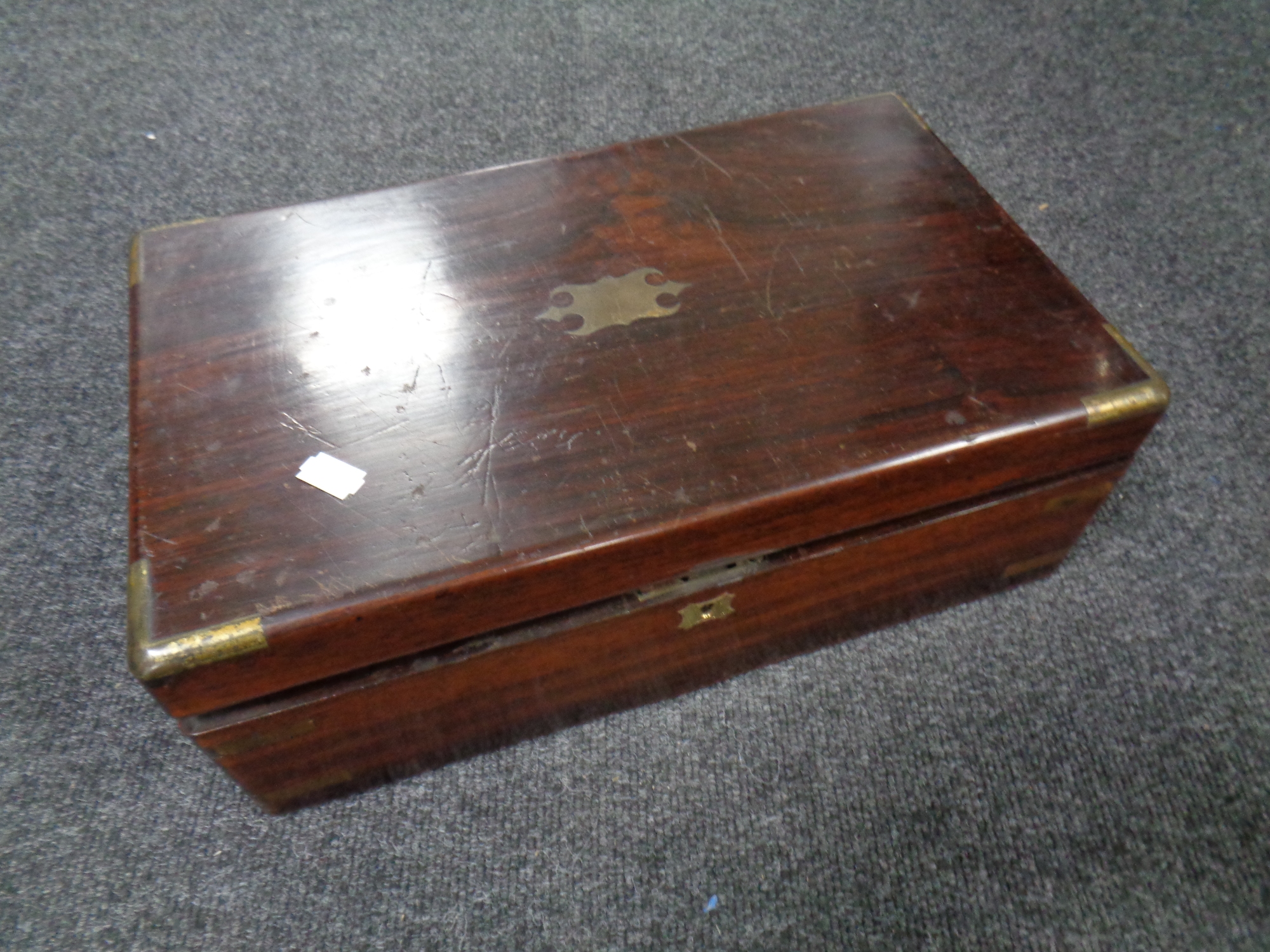 A 19th century brass bound writing box