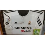 FOOTBALL, signed white Real Madrid shirt by David Beckham, attractively mounted, framed & glazed, 35