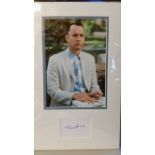 CINEMA, signed white card by Tom Hanks, overmounted beneath colour photo, half-length from Forrest