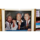 BOXING, signed large photo by Muhammad Ali, Joe Frazier & George Foreman, h/s in suits with raised